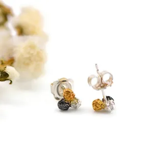 A silver three colours peppercorn stud earrings