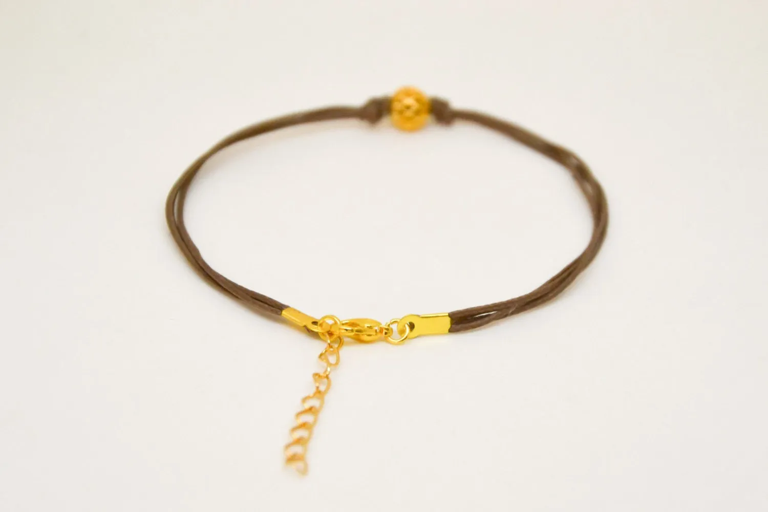 Brown cord bracelet with gold bead, handmade jewelry