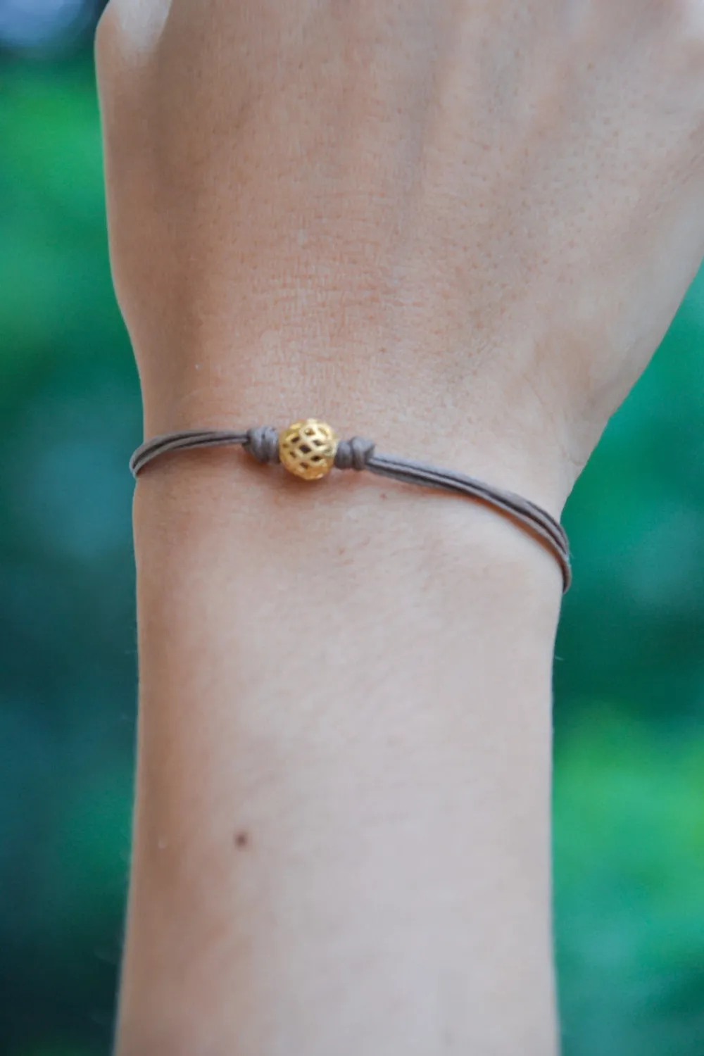 Brown cord bracelet with gold bead, handmade jewelry