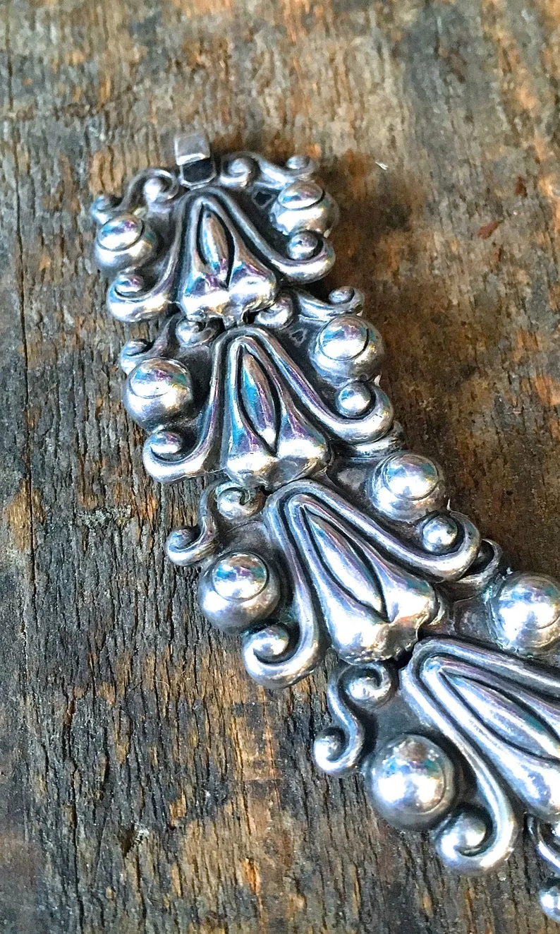 SILVER STRIKE 1950s Mexican Sterling Silver Aztec Pre Columbian Bracelet