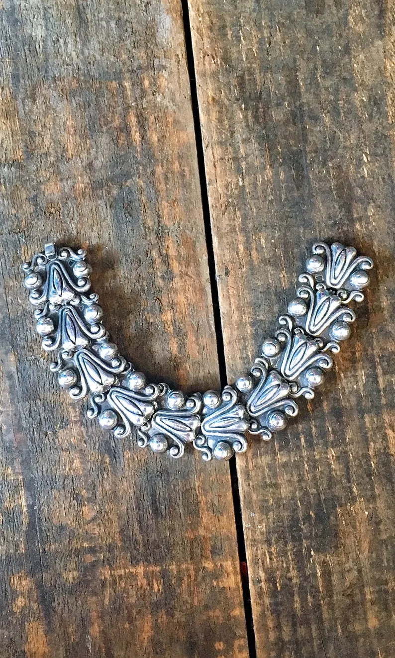 SILVER STRIKE 1950s Mexican Sterling Silver Aztec Pre Columbian Bracelet