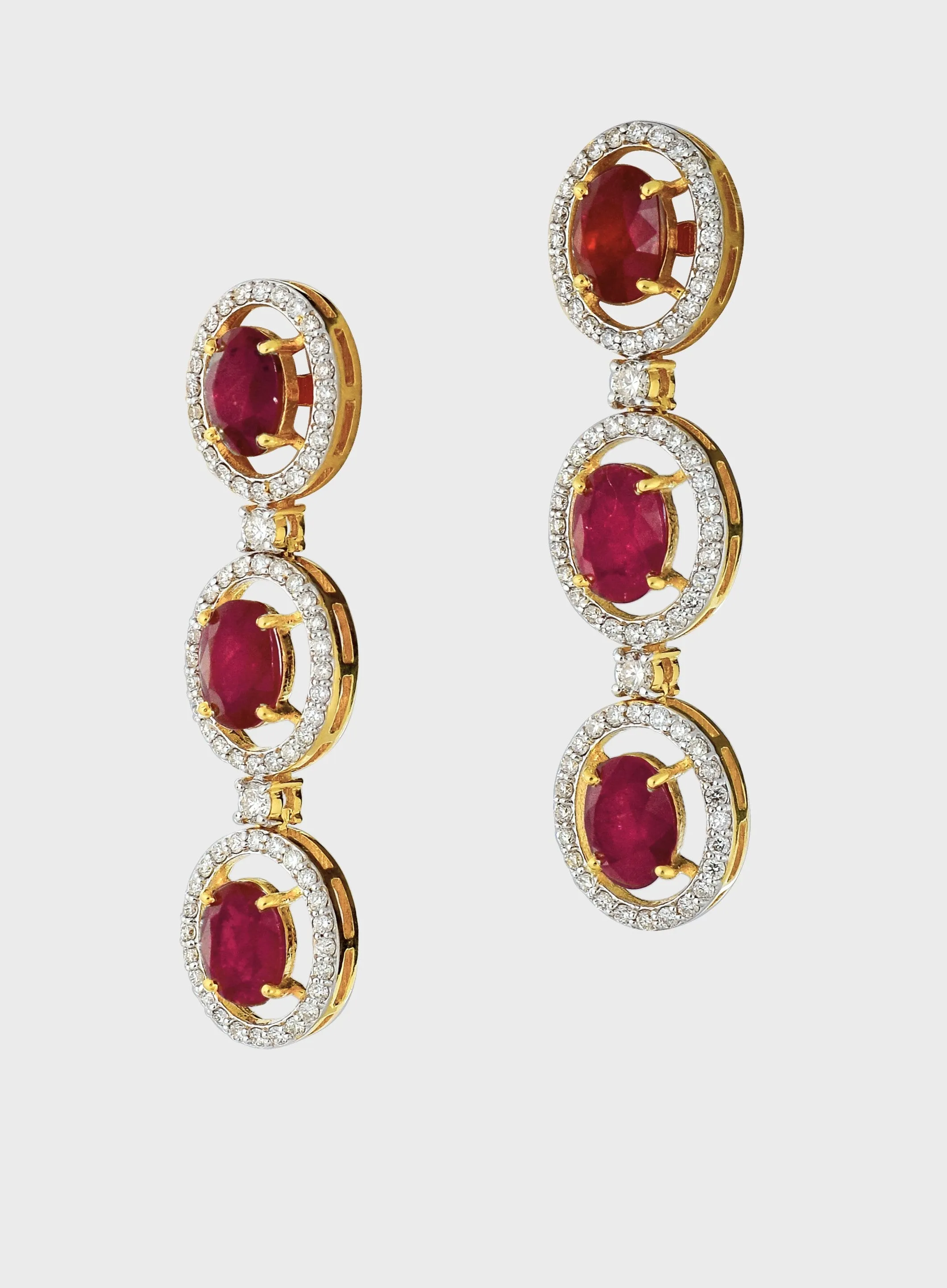 Unveil the epitome of sophistication with our captivating Ruby oval cut necklace and earring pair, adorned with dazzling diamonds.(GDNE0466)