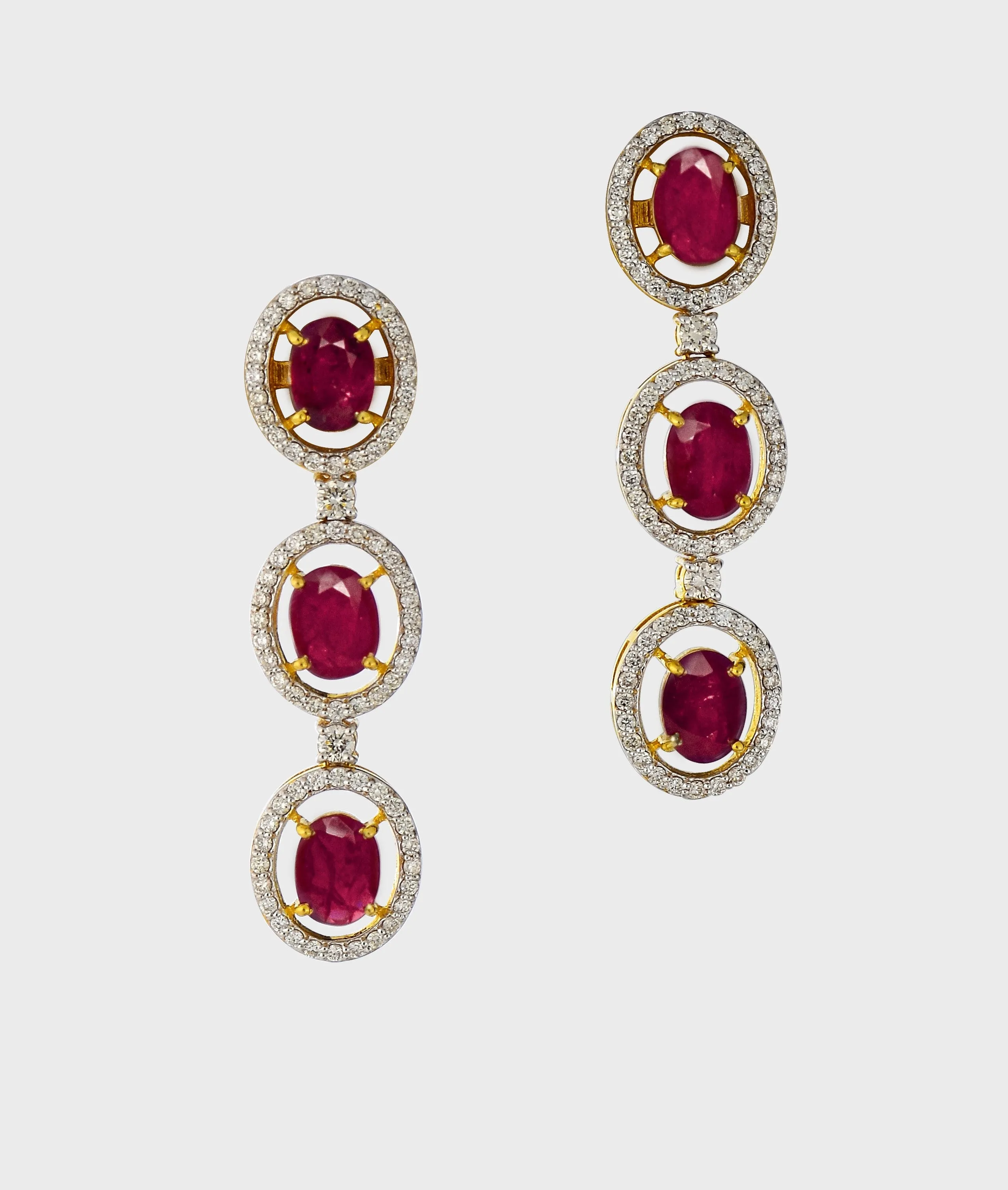 Unveil the epitome of sophistication with our captivating Ruby oval cut necklace and earring pair, adorned with dazzling diamonds.(GDNE0466)